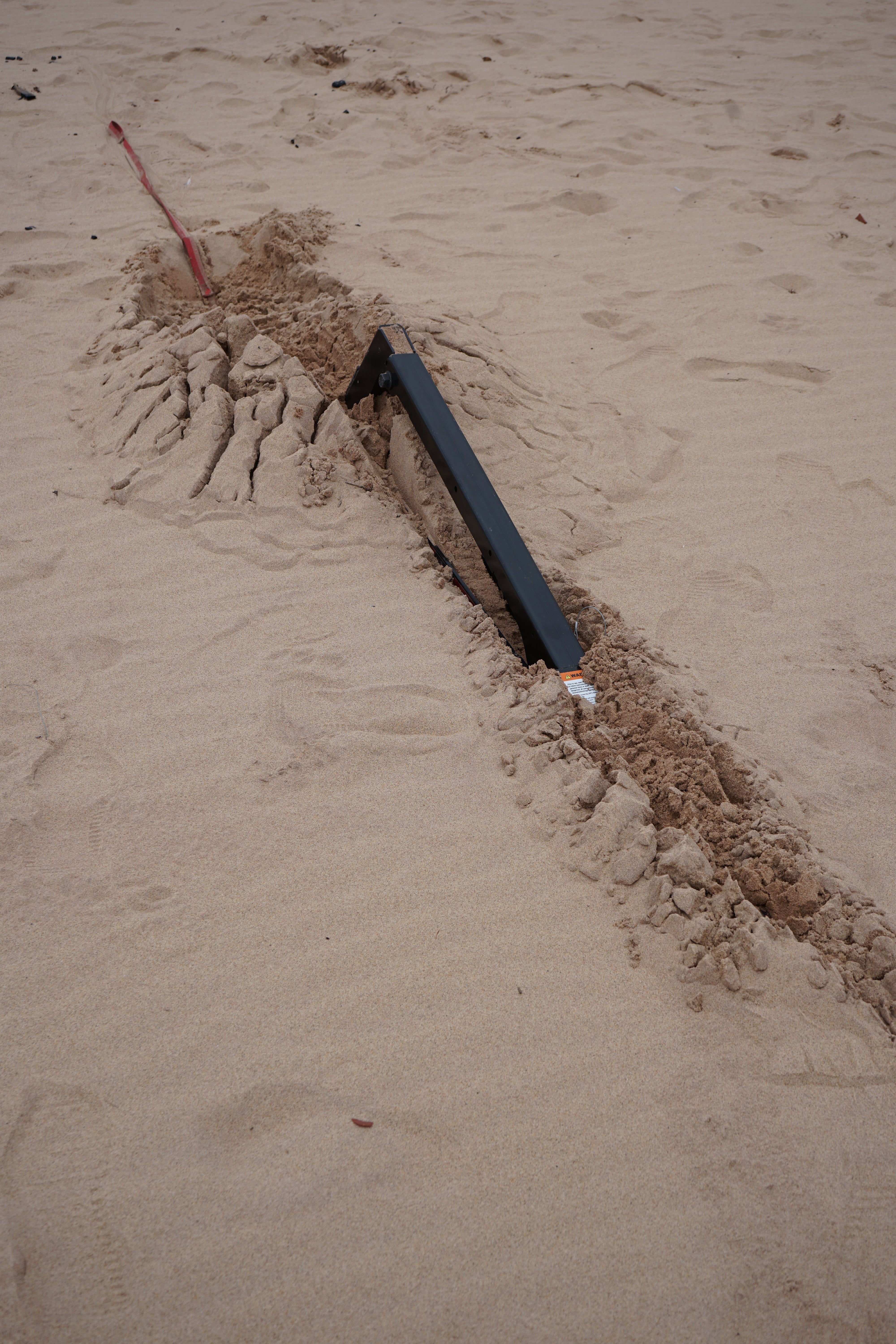 Big GRP buried in sand.