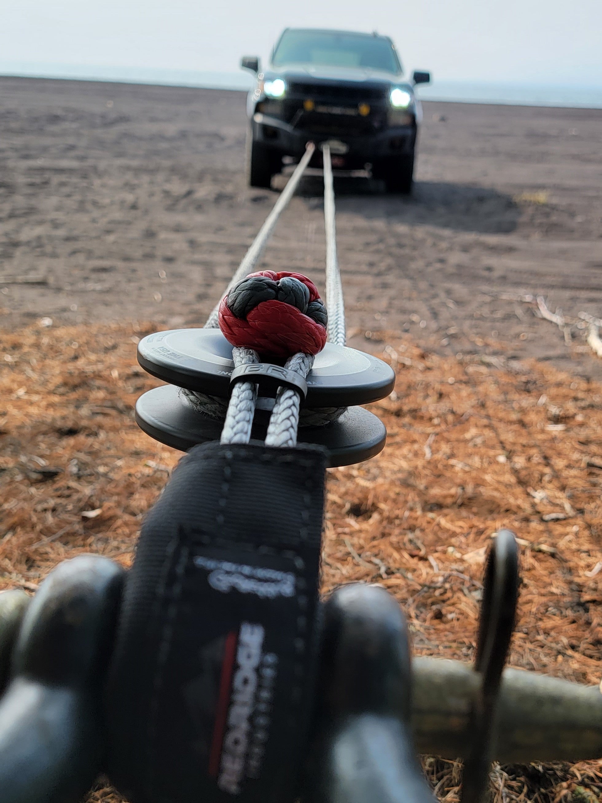 Redridge Industries truck engaged in a self-rescue operation, utilizing a single recovery ring with a soft shackle and Chauffe guard.