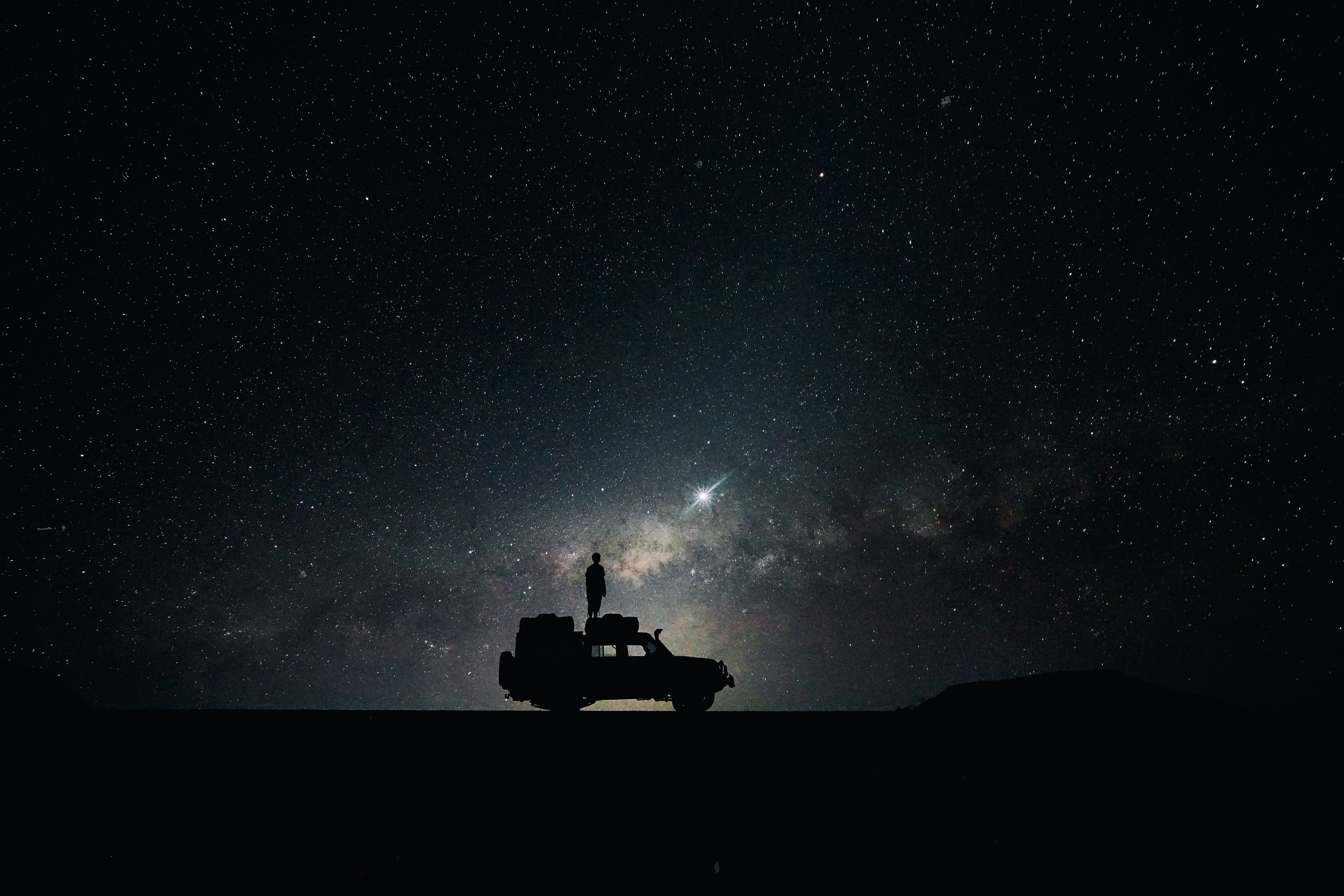 Redridge Industries, header image. Starry night sky with overlanding vehicle. 